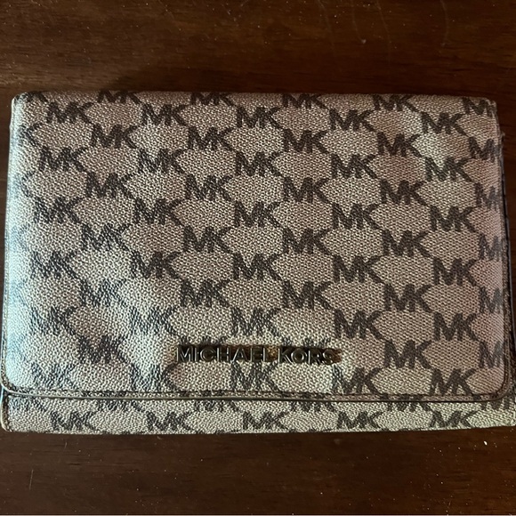 Michael Kors Handbags - Michael Kors Monogram Black and Tan large wallet
